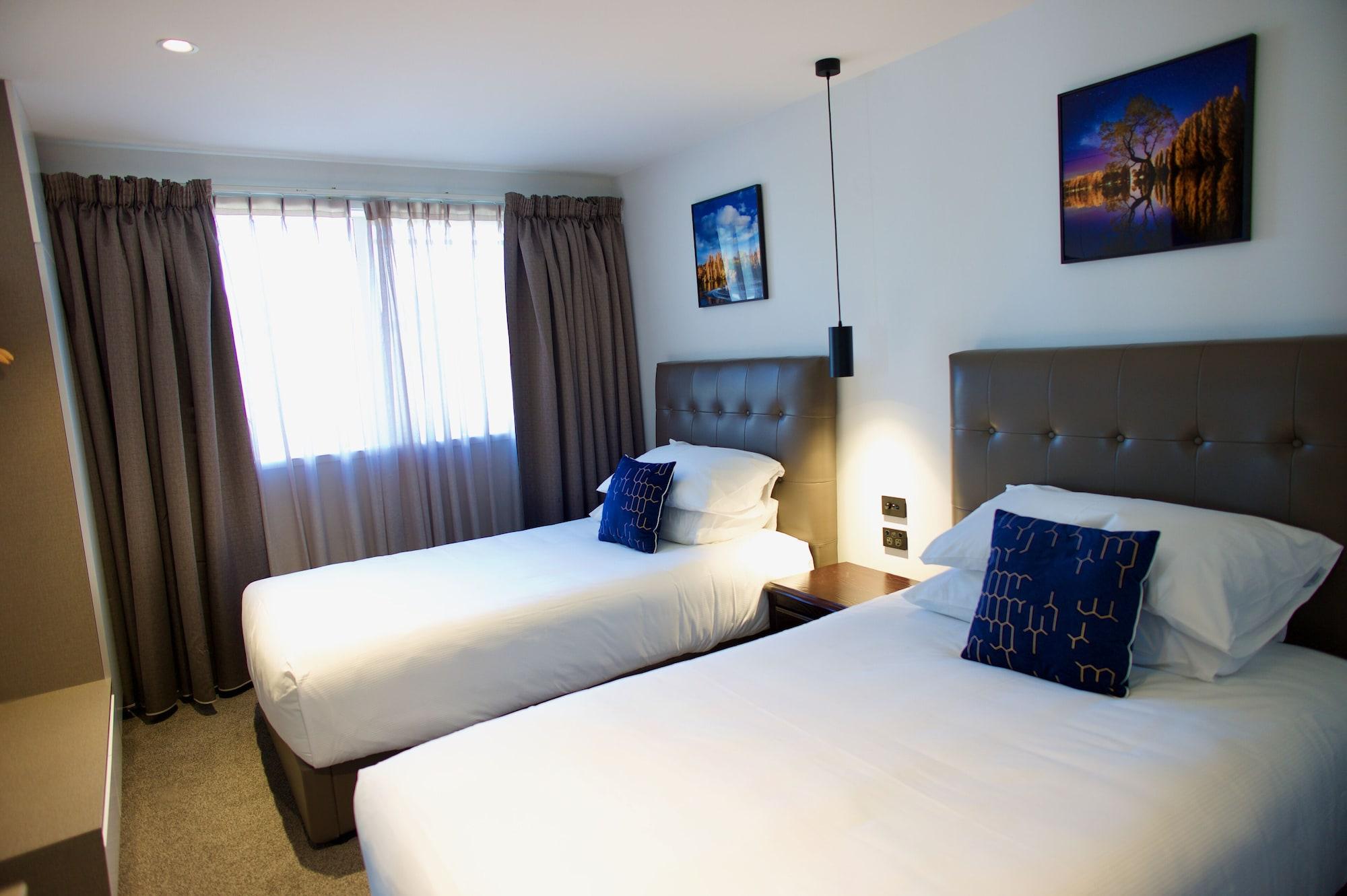 Regal Palms Resort Rotorua Exterior photo A typical bedroom at the hotel